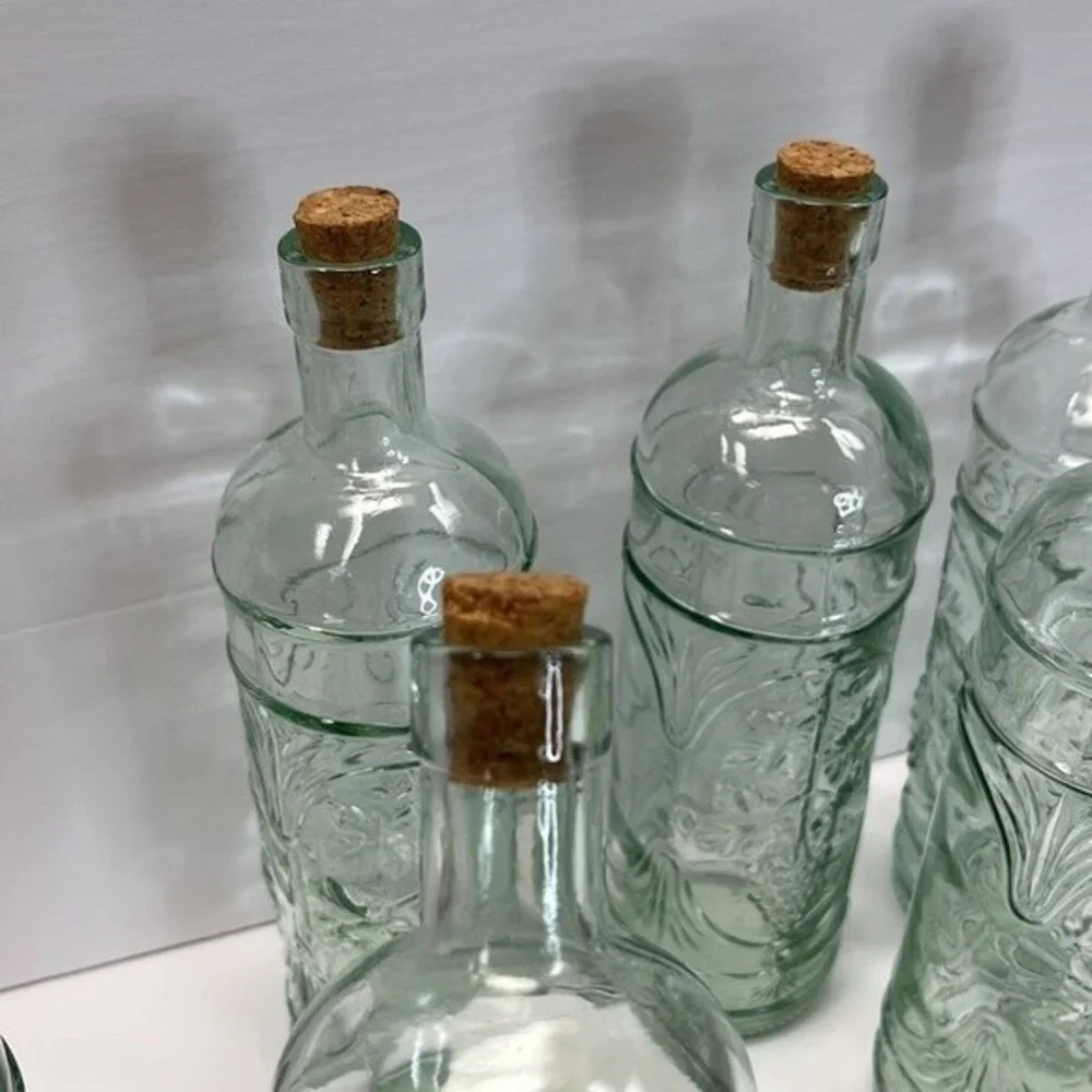 William Sonoma made in Spain Embossed Clear Green Glass Bottles set of 3